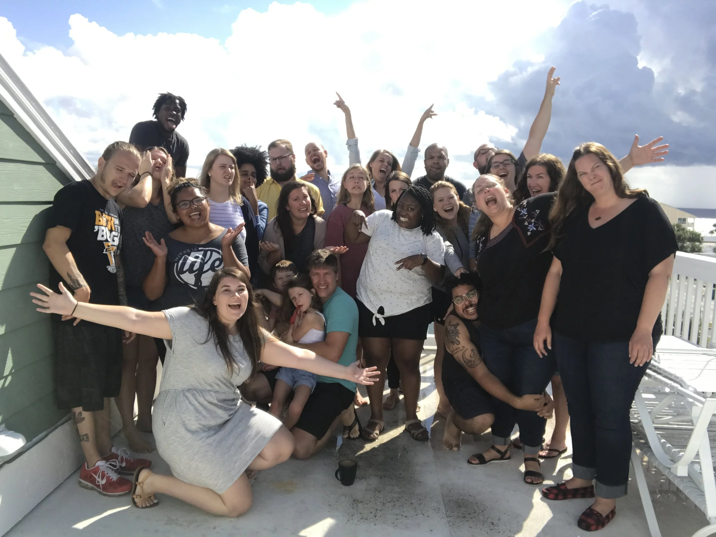 Group celebrating community together on a sunny day